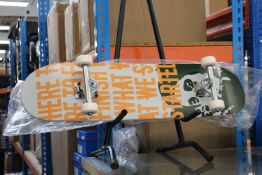 An as new Banksy x Clown Manifesto Orange Skateboard.