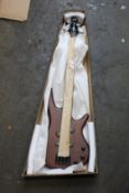 A boxed as new Ibanez GSRM20B GIO miKro Bass - Walnut Flat.