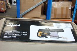 A Squier Affinity PJ electric bass guitar, Fender Rumble 15 AMP and accessories.