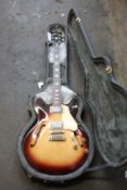 A pre-owned Gibson ES-335 CRS electric guitar in Tobacco Burst.