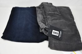 A pair of as new Diesel D-Bazer jeans (W30/L32) and a pair of Fifty Four cords (Size 32).