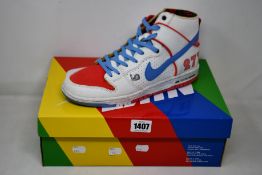 A pair of as new Nike Dunk SB High Pro Ishod Wair x Magnus Walker (UK 10).