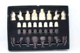 An as new The Lewis Chessmen chess set by National Museums Scotland.