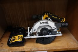 An as new DeWalt DCS512N Brushless XR Circular Saw 12V (No battery) with a DeWalt DCB112 charger.