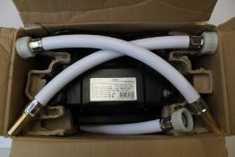 An as new Turboboost 1.5 MK2 twin shower pump (TS-50-2+).