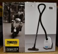 A new Zanussi Compact Go ll White, 750W, 1.5L, 5M automatic cord rewind vacuum cleaner.