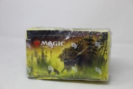 A MTG TCG Time Spiral draft booster box (Box is sealed but seal is loose, box has some minor