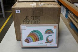 Twelve boxed as new Circus 8-piece stacking rainbow toys.