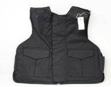 A Safe Guard Armour Patrol 1 tactical armour vest in Black, with a detachable 'Public Safety' velcro