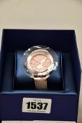 An as new Swarovski Octea Lux watch (RRP £310).