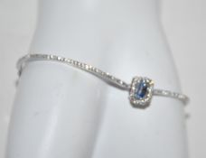 A Swarovski Millenia bangle, octagonal cut Swarovski Zirconia, Blue, Rhodium plated.