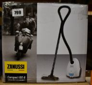 A new Zanussi Compact Go ll White, 750W, 1.5L, 5M automatic cord rewind vacuum cleaner.
