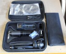 An as new Visio golf putting laser with tripod stand.