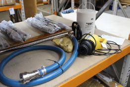 A pre-owned Lutz MI 4 Drum Pump Set (Some damage to handle).