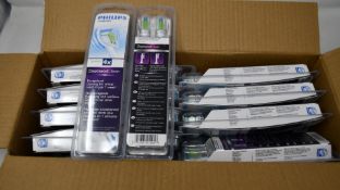 Twenty Philips Sonicare Diamond Clear standard replacement brush heads.