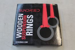 Ten boxes of Sundried wooden suspension rings.