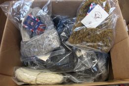 A quantity of as new Highland 2000 100% British wool beanie hats (23 items).