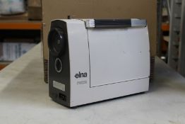 A pre-owned Elna Lotus SP portable electric sewing machine (Item untested and may be incomplete,