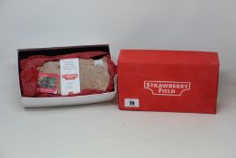 A brick recovered from the Salvation Army Children's Home on Strawberry Field Liverpool (Number: