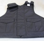 A Safe Guard Armour Patrol 1 tactical armour vest in Black, with a detachable 'Public Safety' Velcro