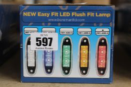 A box of Boreman easy fit flush marker lamps (1001-4500-A) (20 in the box).