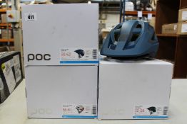 Four branded bike helmets to include a Fox Speedframe, two POC Axion SPIN and an Omne Air SPIN (Some