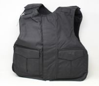 A Safe Guard Armour Patrol 1 tactical armour vest in Black, with a detachable 'Public Safety' velcro