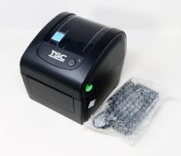 A pre-owned TSC DA200 Desktop Direct Thermal Barcode Printer (Power supply included) (Tested,