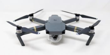 A pre-owned DJI Mavic Pro Drone with battery, controller, spare propellers and storage bag (
