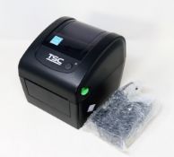 A pre-owned TSC DA200 Desktop Direct Thermal Barcode Printer (Power supply included) (Tested,