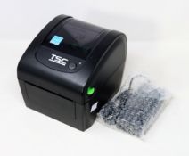 A pre-owned TSC DA200 Desktop Direct Thermal Barcode Printer (Power supply included) (Tested,