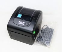 A pre-owned TSC DA200 Desktop Direct Thermal Barcode Printer (Power supply included) (Tested,