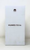 A boxed as new Huawei P30 lite (MAR-LX2) 6GB/128GB in Peacock Blue (Box sealed. UK plug) (IMEI: