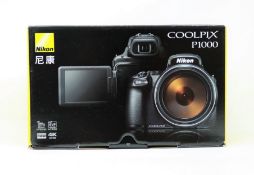 A boxed as new Nikon COOLPIX P1000 16MP 125x Optical Zoom Digital Camera (M/N: CPX P1000 BK SG) (