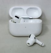 A pre-owned pair of Apple Airpods Pro in Wireless Charging Case (A2083).