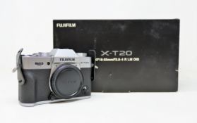 A boxed as new Fujifilm X-T20 Mirrorless Digital Camera in Silver with Fujinon XF18-55mm F2.8-4 R LM