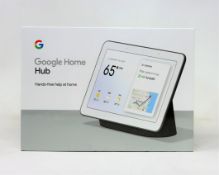 A boxed as new Google Nest Hub in Charcoal (GA00515-US) (Box sealed).