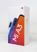 A boxed as new Xiaomi Mi A3 4GB/64GB in More Than White (Box opened. Two pin plug).