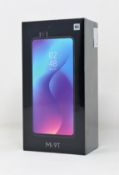 A boxed as new Xiaomi Mi 9T Dual LTE 128GB 6GB Smartphone in Glacier Blue (Box sealed. 2-pin plug