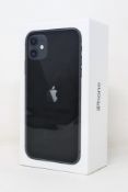 A boxed as new Apple iPhone 11 (A2221, Global) 128GB in Black (Box sealed. Some packaging text in