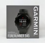 A boxed as new Garmin Forerunner 945 GPS Running Watch in Black (Box sealed).