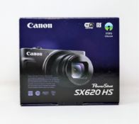 A boxed as new Canon PowerShot SX620 HS 20.2MP Digital Camera (2-pin plug included).