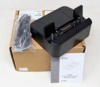 A pre-owned Zebra ETX Single Slot Charge and Communication Dock (P/N: CRD-ET5X-1SCOM1) (Boxed).