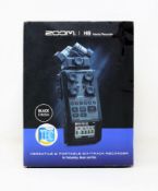 A boxed as new Zoom H6 Handy Portable Recorder in Black (Box opened, damage to box).