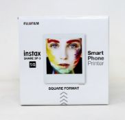 A boxed as new Fujifilm Instax SP-3 Share Square Wireless Photo Printer in White.