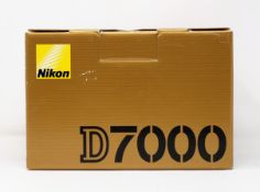 A boxed as new Nikon D7000 16.2MP Digital SLR Camera (Body Only).