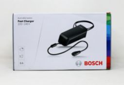 A boxed as new Bosch eBike Systems Fast Charger (220-240v 6a EU) (Box sealed).