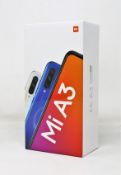 A boxed as new Xiaomi Mi A3 4GB/64GB in More Than White (Box sealed. Two pin plug).
