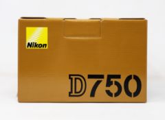 A boxed as new Nikon D750 Digital SLR Camera (Body Only) (UK plug included).