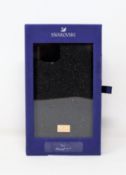 A boxed as new Swarovski High Phone Case for iPhone 11 Pro in Black (P/N: 5592031) (Box sealed).